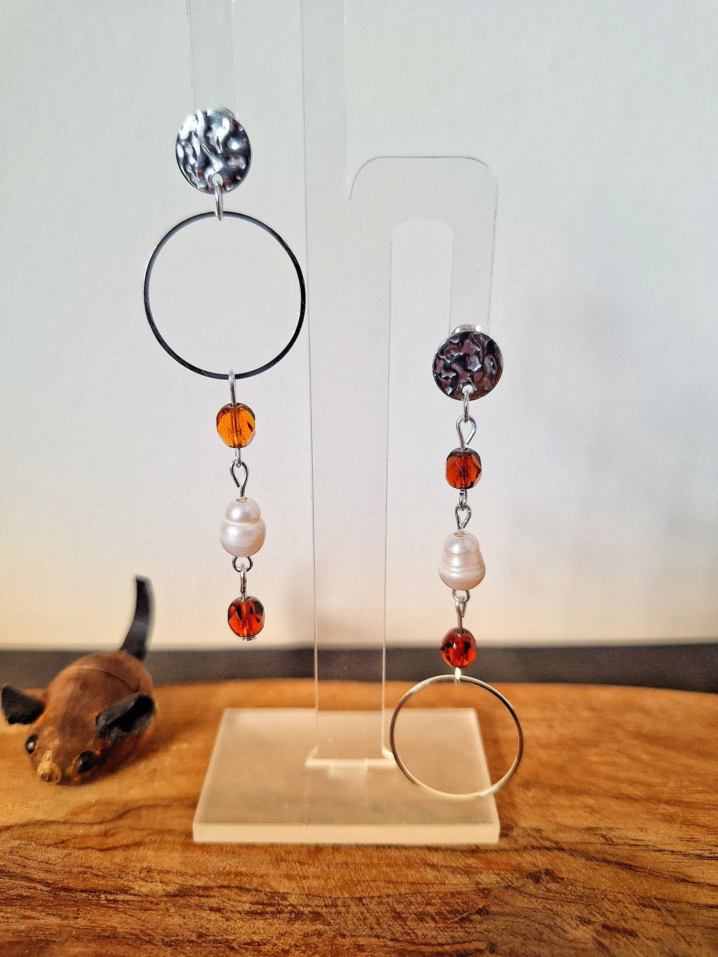 Anastasia Pearl and Vintage Bead Earrings with repurposed freshwater pearls and amber glass beads on display stand.