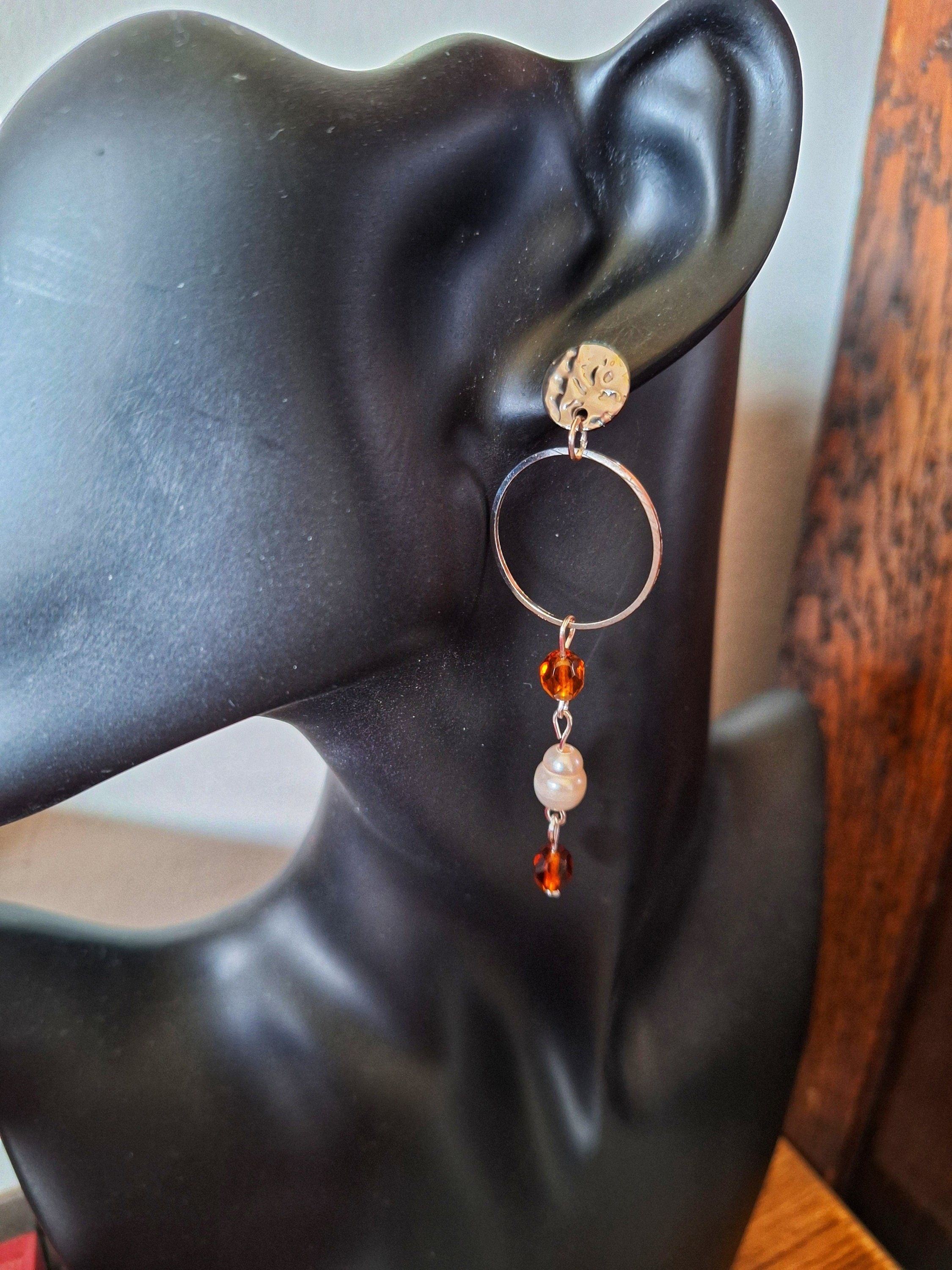 Anastasia pearl and vintage bead earrings with amber-hued faceted glass beads.