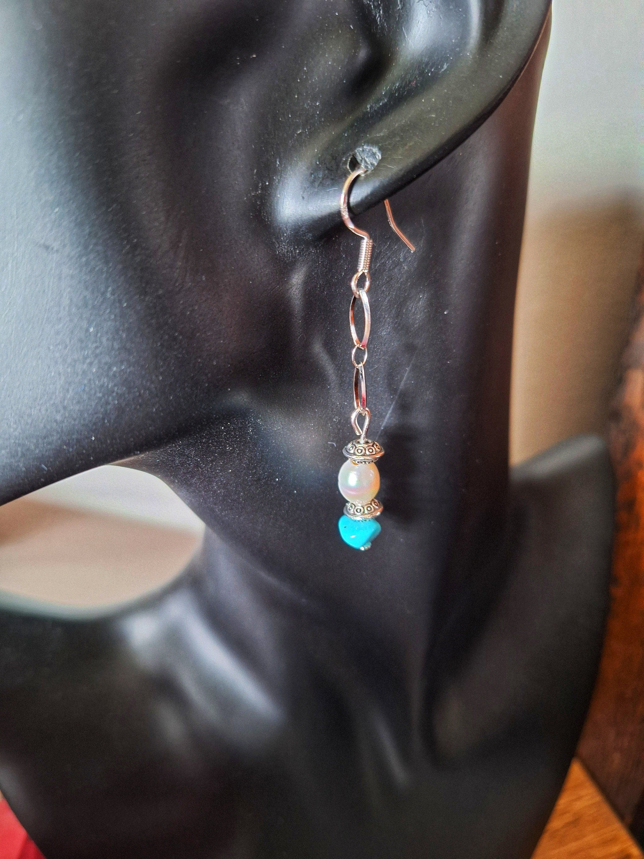 Arabella Turquoise and Pearl Earrings featuring genuine turquoise and freshwater pearls on sterling silver ear wires.