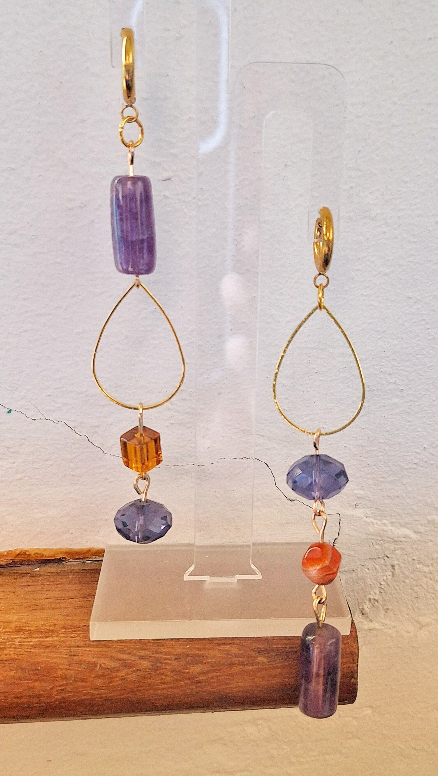 Chloe Mismatched Earrings with amethyst, tourmaline, and glass beads on gold-plated huggies.