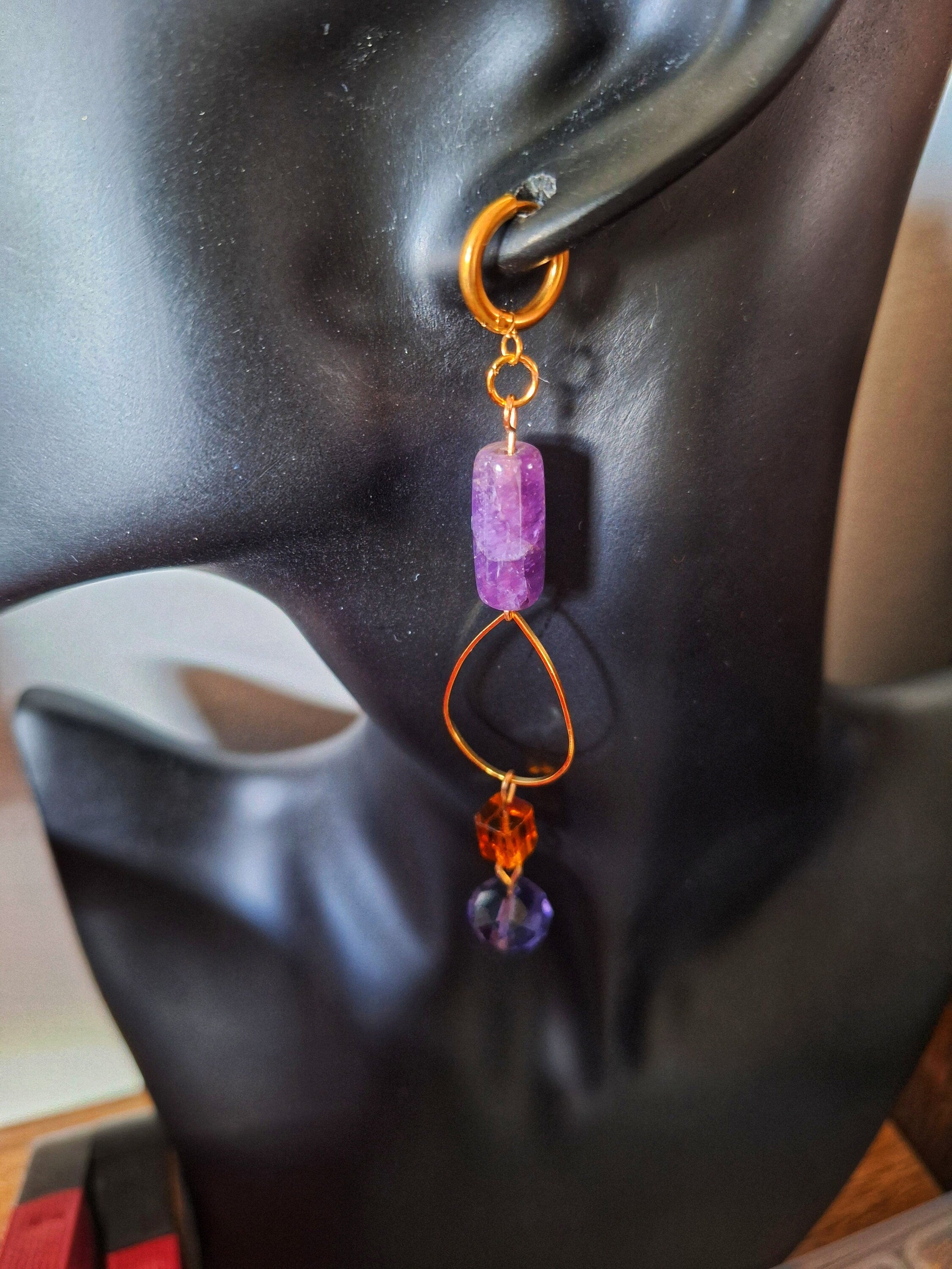 Chloe Mismatched Earrings featuring repurposed amethyst, tourmaline, and glass beads on gold-plated huggies.