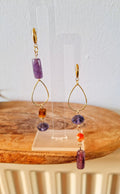 Chloe Mismatched Earrings with amethyst, tourmaline, and glass beads on gold-plated huggies.