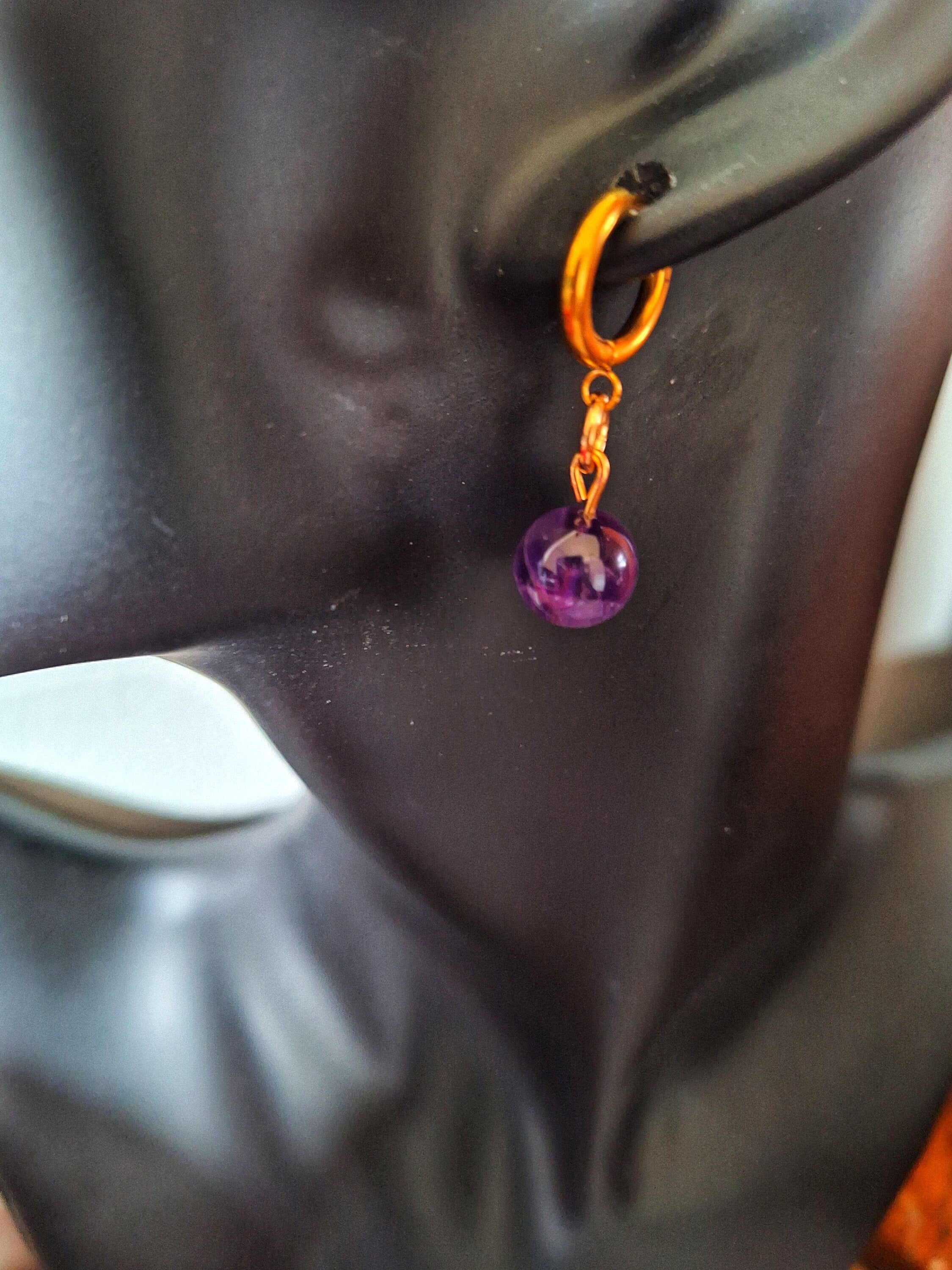 Lydia Amethyst Huggies with genuine amethyst bead on gold-plated hoop.