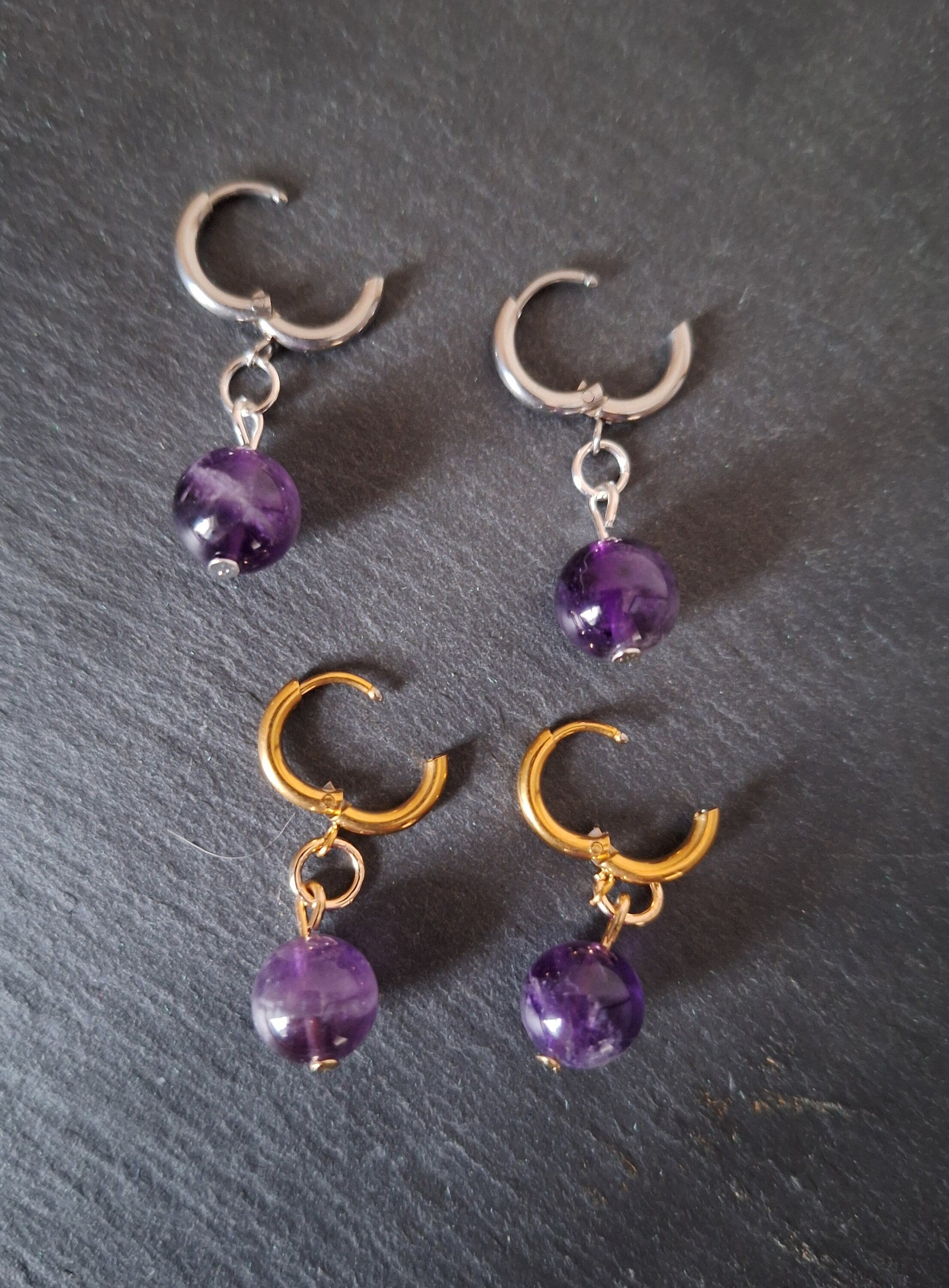 Lydia Amethyst Huggies with amethyst beads on stainless steel and gold-plated hoops.