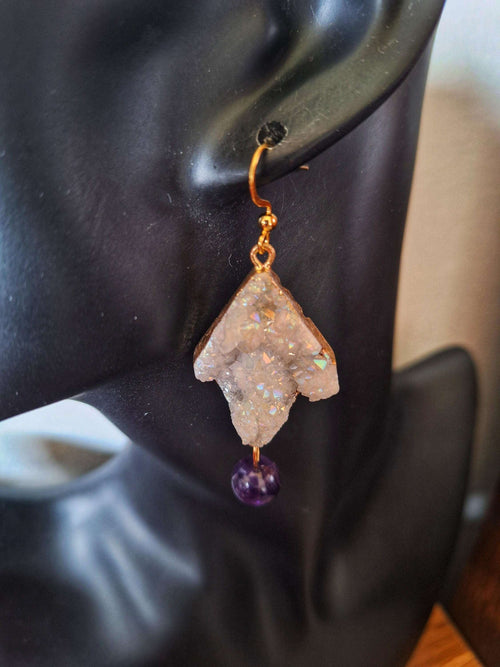 Aphrodite Quartz and Amethyst Earrings with gold-plated findings on display mannequin.