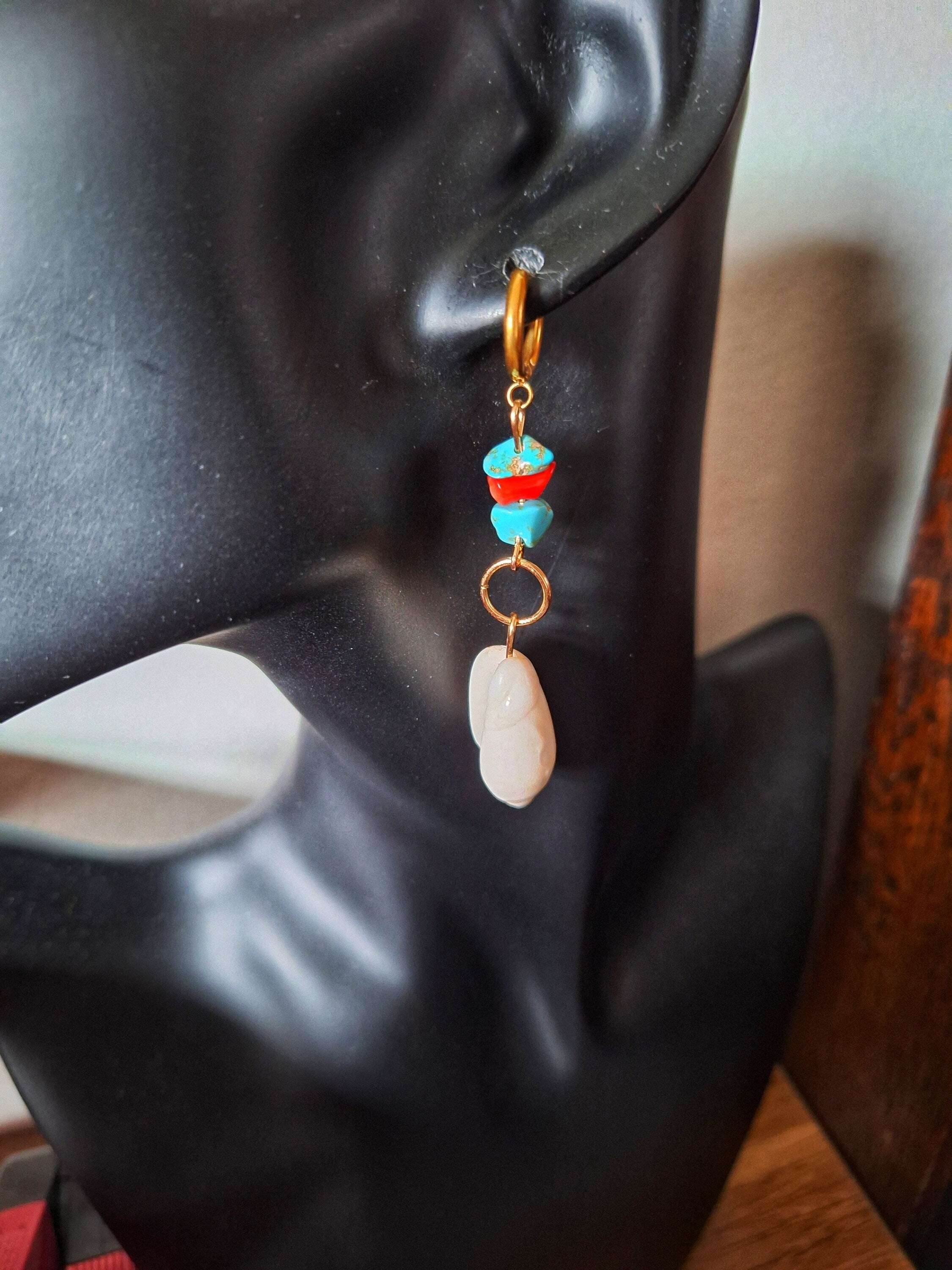 Ariel turquoise and coral shell earrings on mannequin display with gold-plated huggie hoops.
