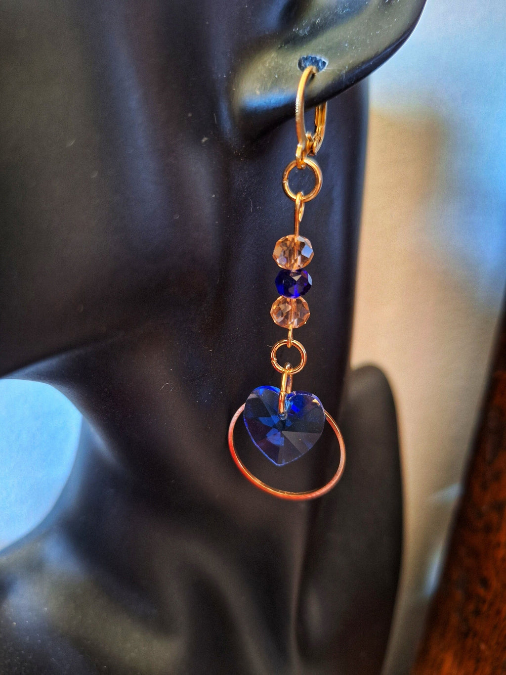 Amy Blue Heart Earrings with blue and pink glass beads on gold-plated huggie hoops.
