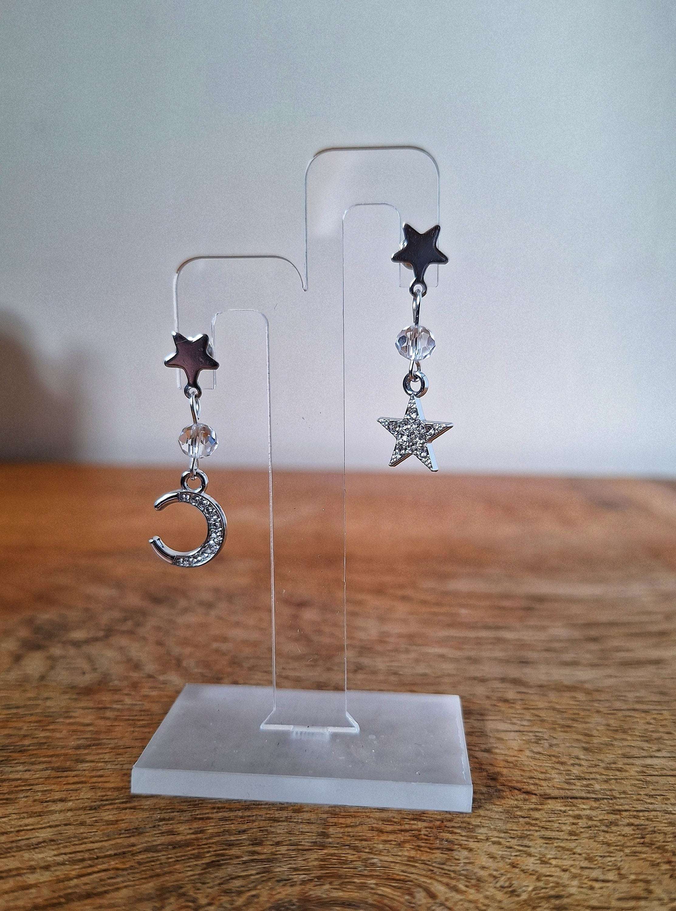 Nova Moon and Star Earrings with crystal beads and silver plated charms on star-shaped studs.