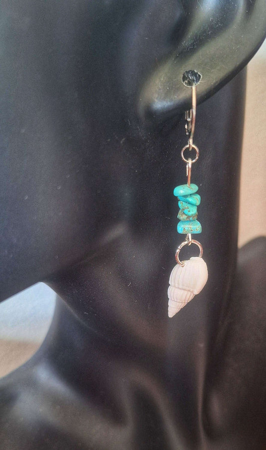 Turquoise and Conch Shell Earrings with turquoise chips and white conch shell on stainless steel huggie.