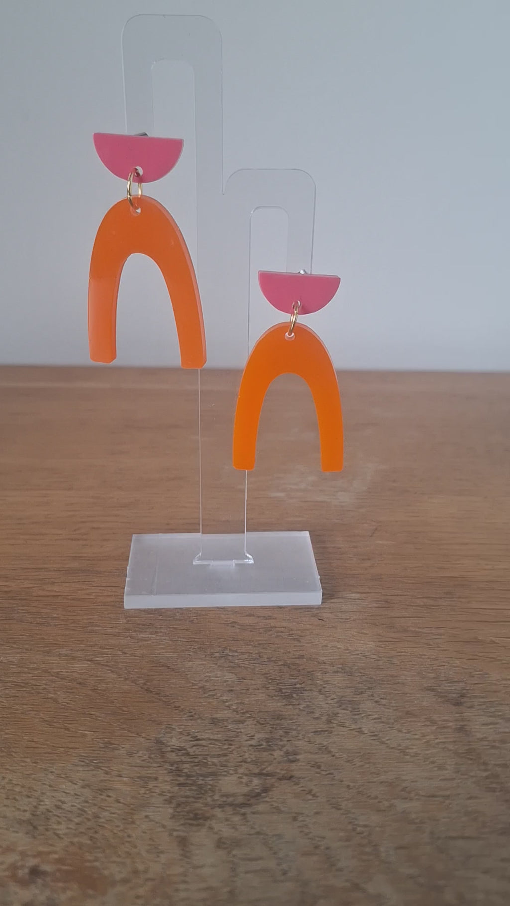 Orange and pink resin arch earrings